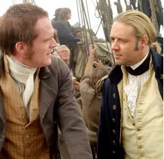  ??  ?? NATURALIST AND CAPTAIN: Paul Bettany and Russell Crowe in the film of Patrick O’Brian’s ‘Master and Commander’