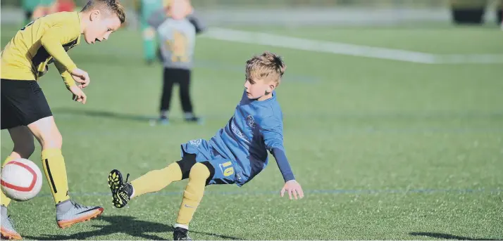  ??  ?? Russell Foster Under-10s football between Hebburn Town Blue Barca (yellow) and Hetton Juniors Lazio, played at Silksworth Sports Complex, Sunderland.