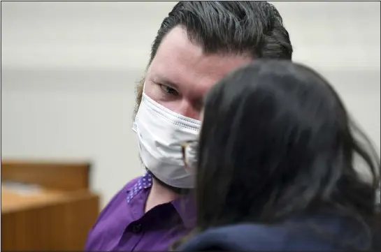  ?? THOMAS PEIPERT — THE ASSOCIATED PRESS, POOL ?? Miles Harford appears in court to hear the charges against him Friday in Denver. Harford, a former funeral home owner accused of keeping a woman’s corpse in the back of a hearse for two years and hoarding the cremated remains of 35people, has been charged with forgery, theft and abuse of a corpse.