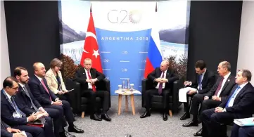  ??  ?? Russian President Vladimir Putin and Erdogan attend a meeting on the sidelines of the G20 leaders summit in Buenos Aires. — Reuters photo