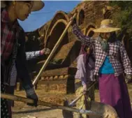  ?? MINZAYAR OO/THE NEW YORK TIMES ?? Restoratio­n at Pyathat Gyi Temple. The government is seeking World Heritage status for Bagan.