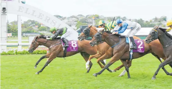  ?? Picture / Trish Dunell ?? Rosie Myers rides August Edition (8) to victory in yesterday’s $100,000 Karaka Cup at Ellerslie.