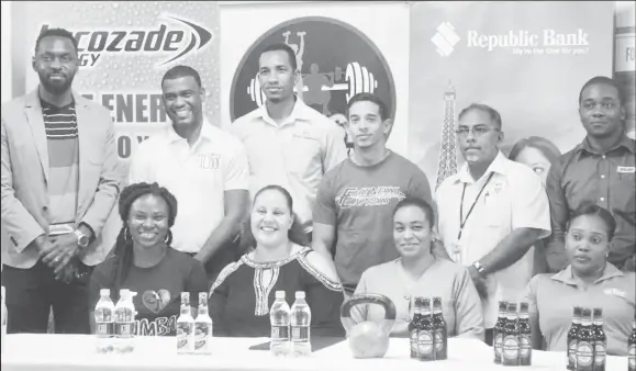  ??  ?? The sponsors and the organizers of the fourth annual Guyana Fitness Games’ Health and Fitness Expo pose for a photo Tuesday night following the launch at the Genesis Fitness Express Gym. The two-day event will be held at the Cliff Anderson Sports Hall starting Saturday.