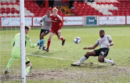  ?? Barrington Coombs/PA ?? Chuks Aneke scores for Charlton Athletic during their Sky Bet League One match against Accrington at The Wham Stadium last month. Bristol City are believed to be among several clubs eager to sign him