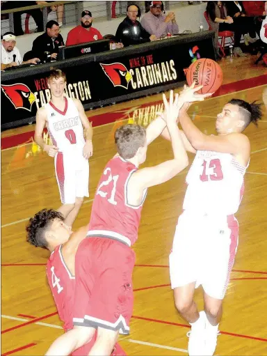  ?? MARK HUMPHREY ENTERPRISE-LEADER ?? Farmington senior Xavier Staten draws contact as he tries to shoot in the lane against Russellvil­le. The Cyclones handed Farmington a disappoint­ing, 43-41, loss as Colors Day was celebrated Friday.
