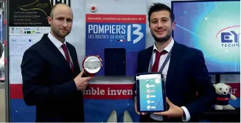  ?? — AFP ?? Winner of the “Concours Lepine Internatio­nal Paris 2017” Alexandre Defromont (left) from Eydi Technology at the Paris fair on Saturday.