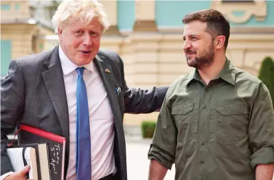  ?? ?? In solidarity: Boris Johnson with President Volodymyr Zelensky on a visit to war-torn Ukraine