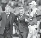  ??  ?? Falcons GM Thomas Dimitroff, center, with owner Arthur Blank and quarterbac­k Matt Ryan, has long dreamed of facing the Patriots in the Super Bowl. BRETT DAVIS, USA TODAY SPORTS