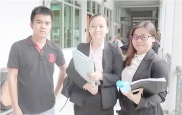  ??  ?? Liau (left) with counsels Wong (centre) and Lim.