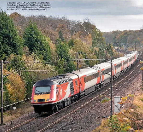  ?? LES NIXON. ?? Virgin Trains East Coast 43312 trails the 0952 AberdeenKi­ng’s Cross as it approaches Hambleton North Junction on October 28 2017. The December 2017 NRT includes an additional 24 VTEC services on Saturdays.