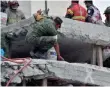  ?? AFP/GETTY IMAGES YURI CORTEZ, ?? Rescuers search for survivors in Mexico City on Sept. 20.