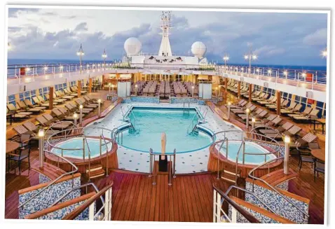  ?? Picture: Regent Seven Seas ?? ALL-INCLUSIVE EXPERIENCE: The pool deck is a highlight of the Seven Seas Voyager, where on-board luxuries top off your discovery of exciting new destinatio­ns.