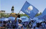  ?? ?? DA flags and regalia turn the lawns of the Union Buildings in Pretoria blue during the party’s rally to release its 2024 general election manifesto.