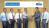  ??  ?? Commercial Bank Deputy General Manager Operations Sanath Bandaranay­ake (third from right) and Ria South Asia Director Operations Sujoy Kanjilal exchanging the agreement in the presence of (from left) Commercial Bank Chief Manager e-banking Pradeep...