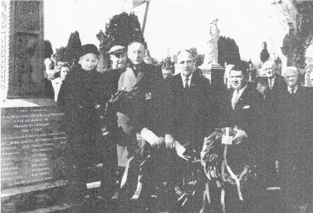  ??  ?? Pictured at an annual Liam Lynch Commemorat­ion event in Kilcrumper Fermoy, year unknown, which includes Johnny Fanning (man with cap Old IRA, back left) - Front l-r: Katie O’Leary (Cumann na mBan), Paddy Ahern (Old IRA), Matt Flood (Old IRA) and Dan O’Donovan (president Fianna Fáil); Back (men on right): Mr Fenton, John Shinnick and Liam Cronin.