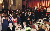  ??  ?? GREEN DREAM SCENE: Montrealer­s of all background­s flocked to the beloved St. Patrick’s Society of Montreal’s charity ball at the Marriott Château Champlain.