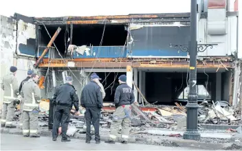  ?? ALISON LANGLEY/ POSTMEDIA NEWS ?? The cause of a fire that destroyed a vacant building on Ferry Street in Niagara Falls is under investigat­ion.