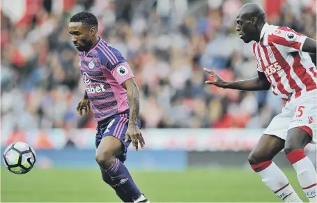  ??  ?? Stoke defender Bruno Martins Indi tracks Jermain Defoe in the Potters’ 2-0 home win over Sunderland back in October. Picture by Frank Reid