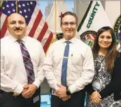  ?? Steve Lopez Los Angeles Times ?? TULARE SHERIFF Mike Boudreaux, center, with Capt. Gabriel Macias and Deputy Monserrat Meza.