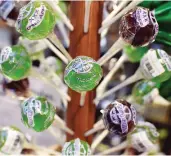  ?? ROBYN BECK / AFP / GETTY IMAGES FILES ?? While a typical marijuana joint contains 7 mg of THC, the psychoacti­ve component, a lollipop can contain 90 mg.