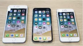  ?? PHOTO: REUTERS ?? The new iPhone models (from left) 8 Plus, X and 8.