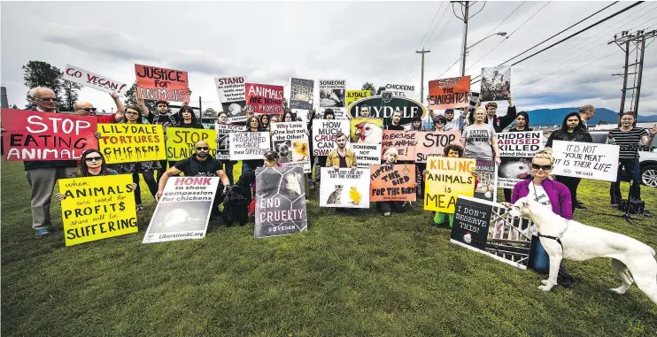  ?? FRANCIS GEORGIAN/PNG ?? About 40 protesters gathered in front of the Lilydale chicken processing plant in Port Coquitlam on Saturday to call for better treatment of animals.