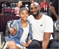  ?? Ethan Miller / TNS ?? Gianna Bryant and her father, former NBA star Kobe Bryant, attend the 2019 WNBA All-Star Game in Las Vegas.