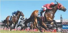  ?? Picture: GETTY ?? HOT FORM: Kerrin McEvoy riding Redzel wins race 7 the Darley Classic on Stakes Day at Flemington on Saturday.