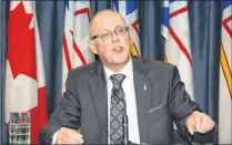  ?? JOE GIBBONS/THE TELEGRAM ?? Health Minister John Haggie releases a report on provincial ambulance services in St. Johns Tuesday.