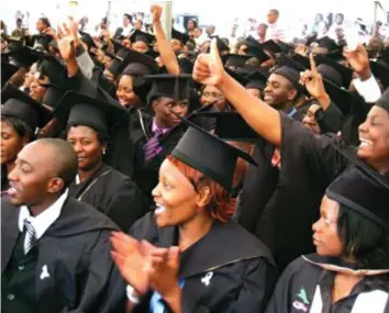  ??  ?? University students at a graduation ceremony