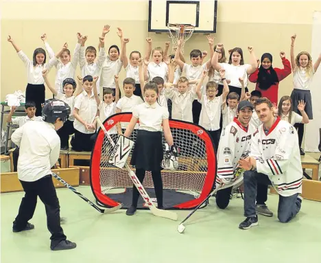  ??  ?? PLAYERS from ice hockey team Dundee Stars have paid a visit to Rosebank Primary School.
The visit was part of the Stars in the Community initiative which aims to raise awareness of the importance of a healthy lifestyle to young people and combat...