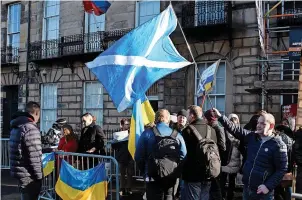  ?? ?? FURY Protesters unofficall­y renamed the street after Ukraine president