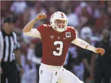  ?? Ezra Shaw / Getty Images ?? Qquarterba­ck K.J. Costello celebrates after the Cardinal got the ball down to the Wildcats’ 1yard line in the fourth quarer.