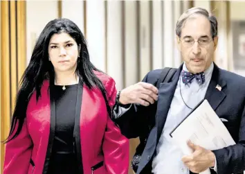  ?? JOSE A. IGLESIAS jiglesias@elnuevoher­ald.com ?? Former Miami-Dade School Board member Lubby Navarro and her attorney, Ben Kuehne, leave court after a brief appearance in Miami on Wednesday. Navarro has already sent the court a written plea of not guilty.