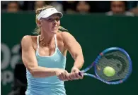  ?? AFP ?? Sharapova returns after a 15-month doping ban. —