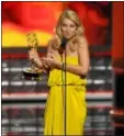  ??  ?? Claire Danes accepts the award for outstandin­g lead actress in a drama series for “Homeland.”