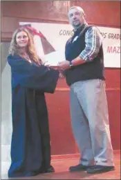  ?? Photos by Agnes Hagin ?? Each student completing the 2015 Teen Maze was presented a diploma. Greg Teems made the presentati­on to Canaan Smith, who said the event was a great experience.