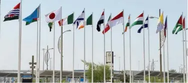  ?? Reuters ?? ↑
Flags of countries participat­ing in the Expo 2020 Dubai are pictured at the world fair site.