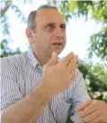  ??  ?? TEL AVIV: Israeli Moshe Farchi, the founder and head of the Stress, Trauma and Resilience Studies at Tel-Hai College, speaks during an interview with an AFP journalist in the city of Tel Aviv. — AFP