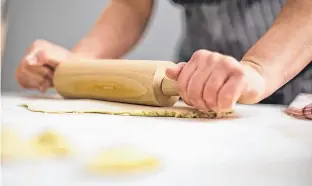  ?? 123RF STOCK ?? Rolling out a thin dough is part of the method for making perogies. Food columnist Margaret Prouse shares a recipe this week for The Best Perogies, which comes from a cookbook written by the late author, Anita Stewart.