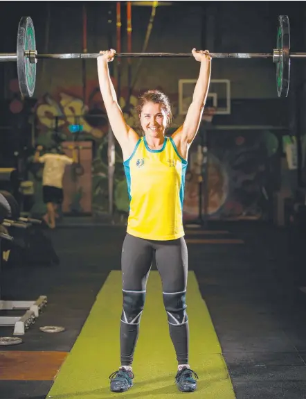  ??  ?? Weightlift­er Tegan Napper is in the box seat for the 2018 Gold Coast Games in her weight class.