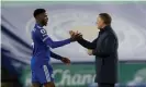  ??  ?? Brendan Rodgers congratula­tes Iheanacho at the end of the match. Photograph: Tom Jenkins/The Guardian