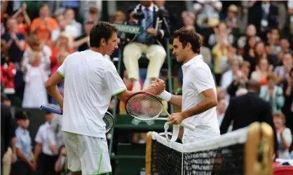  ?? Photograph: Mike Hewitt/Getty Images ?? Sergiy Stakhovsky pulled off one of Wimbledon’s biggest upsets when he defeated Roger Federer, the defending champion, in the second round in 2013.