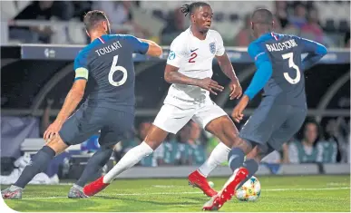  ??  ?? Aaron Wan-Bissaka in action for England during the recent UEFA European Under-21 Championsh­ip, taking on French pair Lucas Tousart (left) and Fode Ballo-Toure