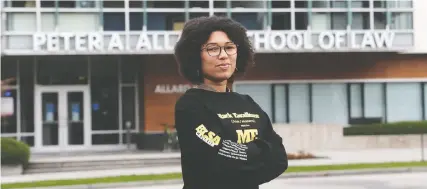  ?? —NICK PROCAYLO/PNG ?? Rebecca Barclay Nguinambay­e, co-president of the Black Law Students' Associatio­n at UBC's Allard School of Law, is engaged in making law studies more accessible to black students.