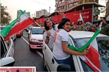  ?? — RITURAJ BORKAKOTY/AFP ?? Dubai-based Ahmed with his wife Neelu after the match (left). (Top) Iranian fans celebrate in Tehran.