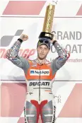  ?? EPA ?? Ducati rider Andrea Dovizioso celebrates on the podium.