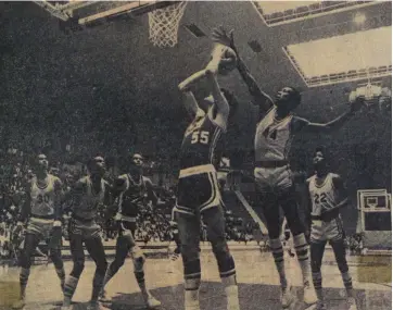  ?? (Arkansas Democrat-Gazette file photo) ?? Sam Biley (44) of Vaster tries to reject a shot by Danny Garrison of Conway in a 1973 State Overall Tournament game at Barton Coliseum in Little Rock.