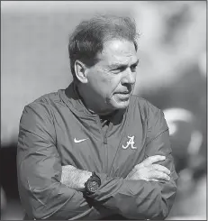  ?? AP/WADE PAYNE ?? Top-ranked Alabama, coached by Nick Saban (left), will put its undefeated record on the line against No. 4 LSU, directed by Ed Orgeron (right), when the two SEC West titans meet Saturday night at Tiger Stadium in Baton Rouge.