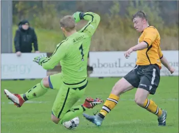  ?? Photograph: Iain Ferguson, alba.photos ?? John Treasurer puts the ball past Inverurie’s Andy Reid to score Fort’s only goal of the match.